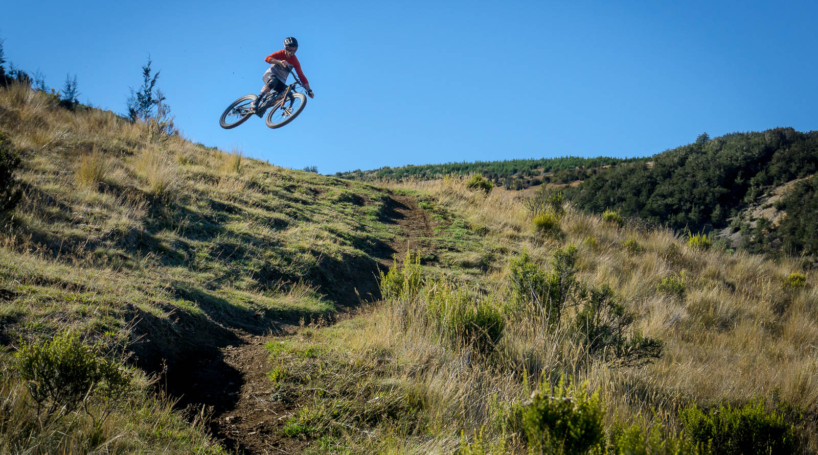 Mountain Biker hitting jump on Dicksons Trail - Find Away Photography
